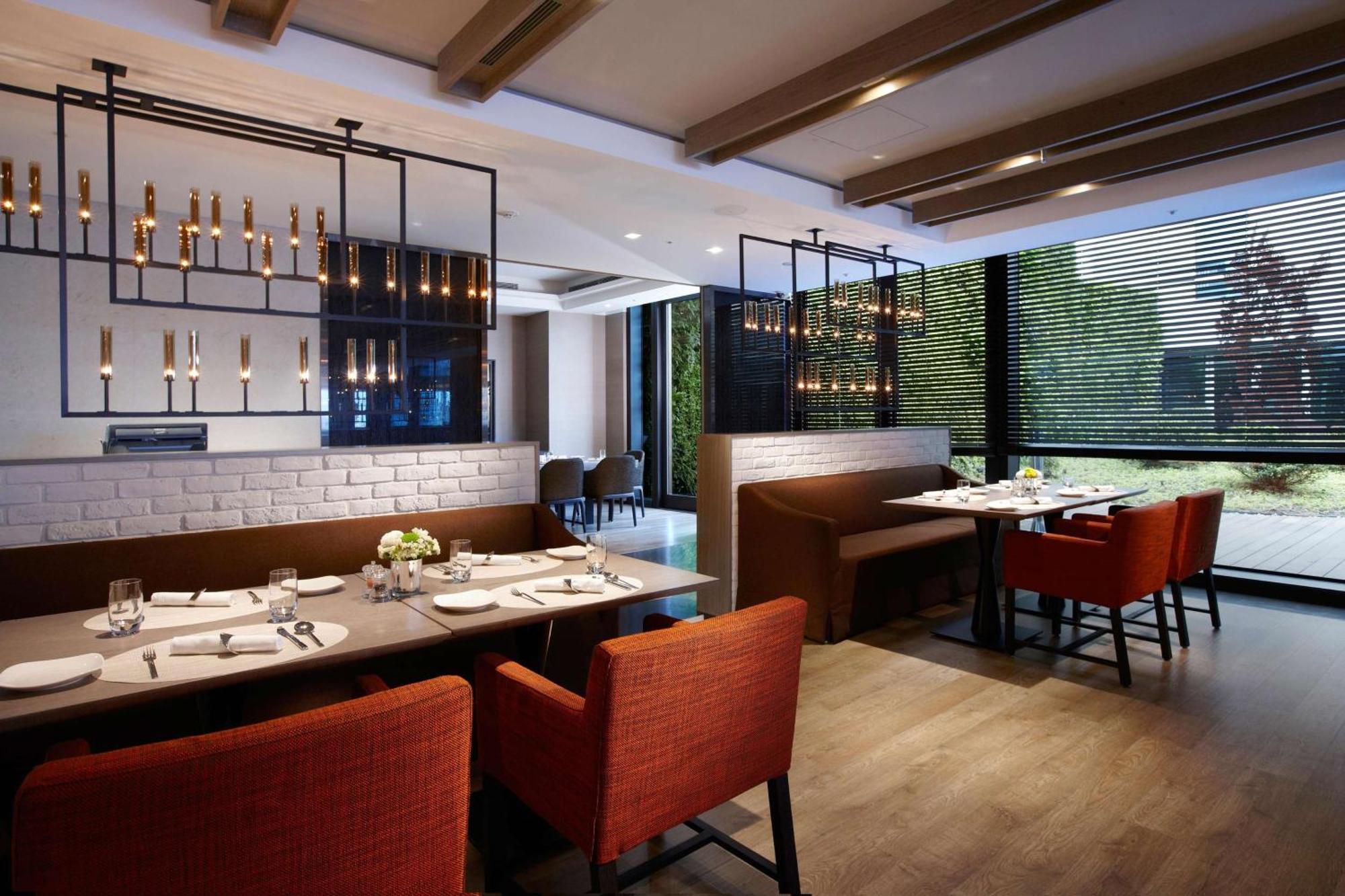 Humble House Taipei, Curio Collection By Hilton Hotel Exterior foto The interior of the restaurant